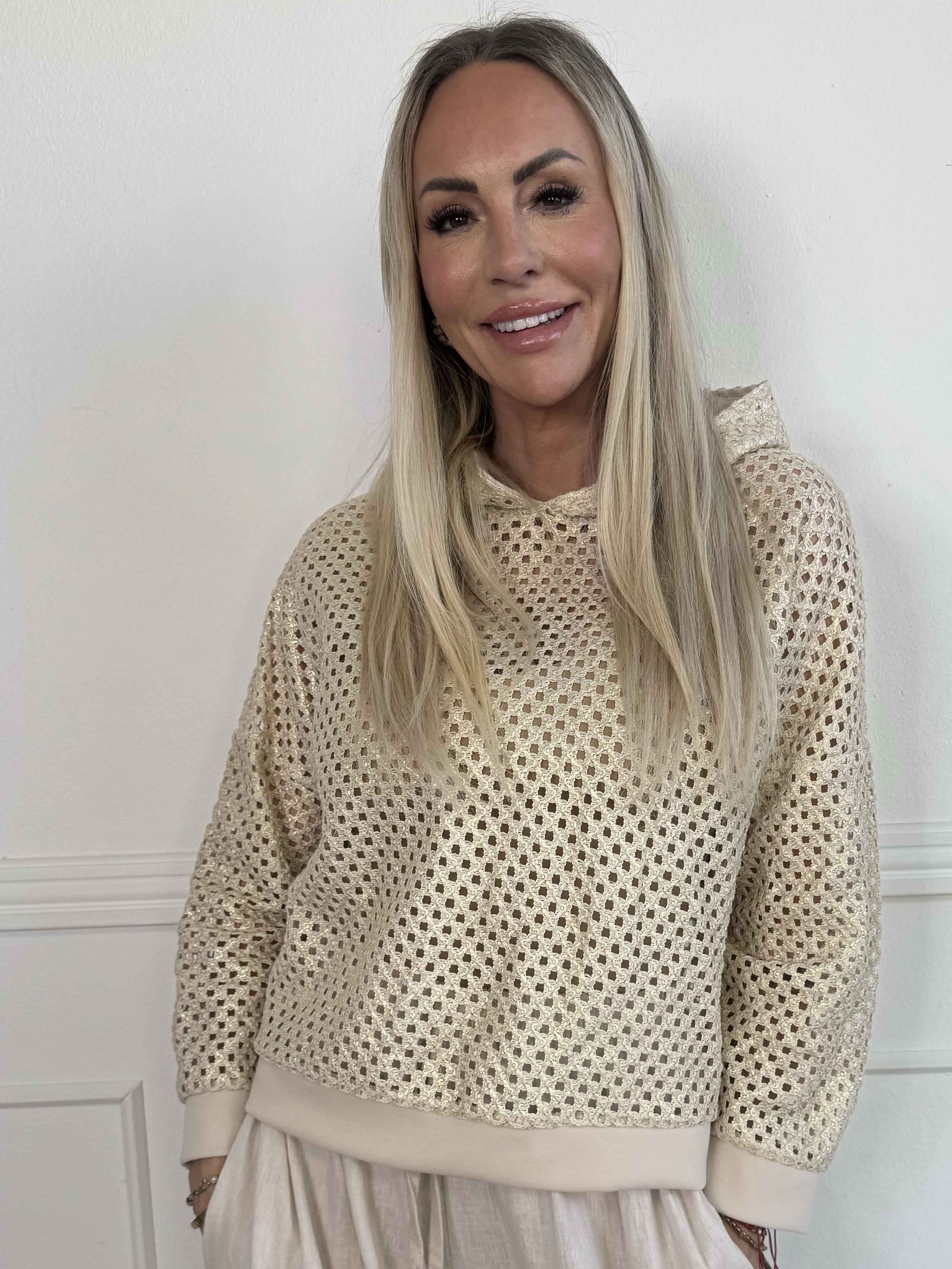 Martha - Hoodie i bomull med hålmönster och lätt glans